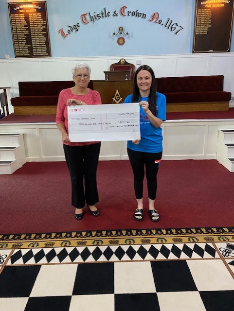 1st July 2023 - Brighteset Stars receiving their Cheque from the HillTop Lodges